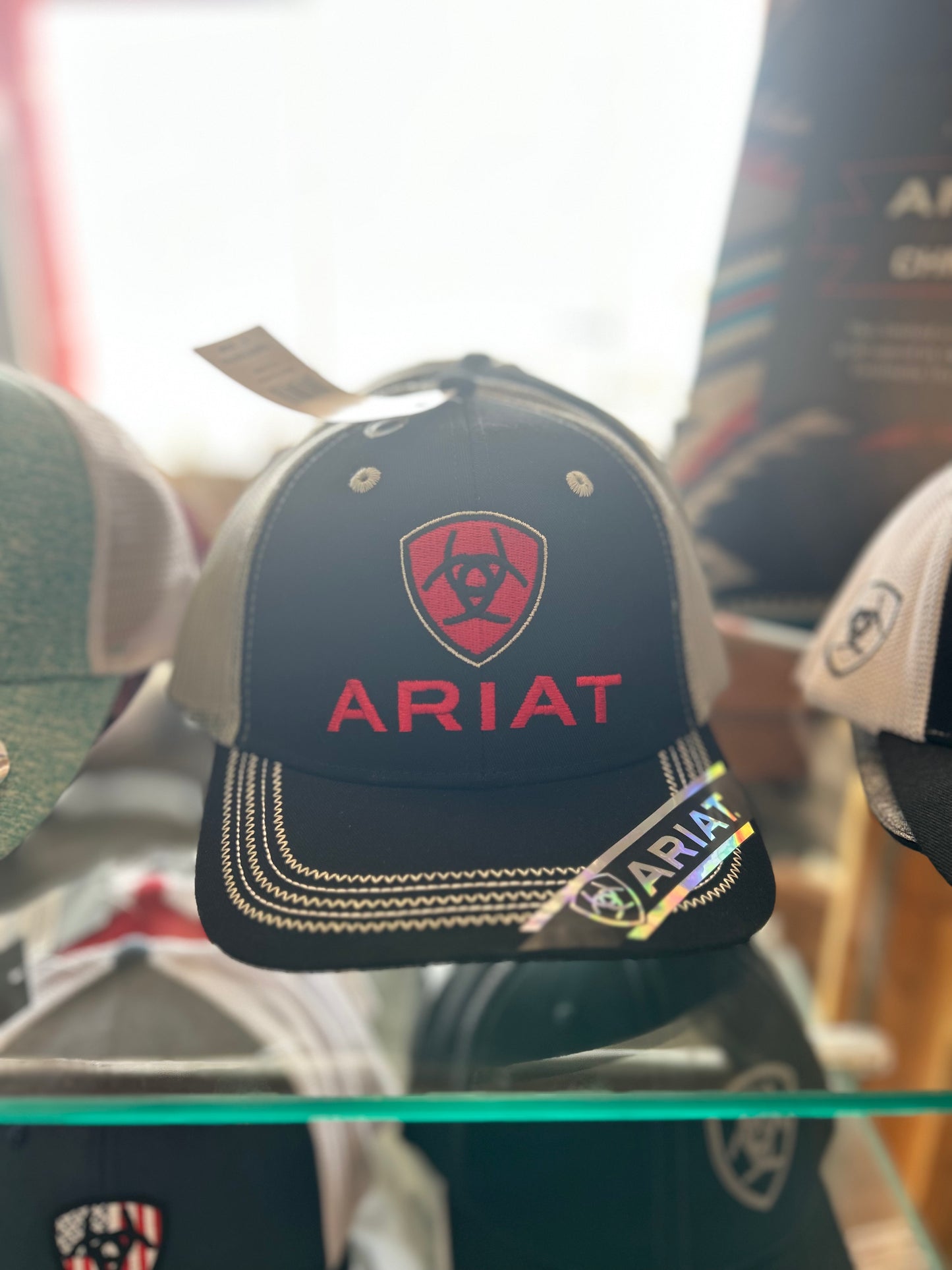 Red and Black Ariat Caps